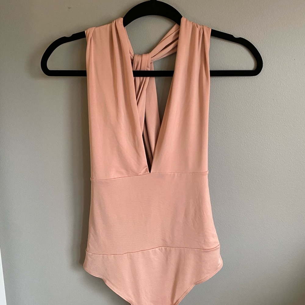 Salmon pink like cut, criss cross back body suit.